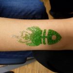 Grüne glitzernde Rakete auch mit Gold dazu